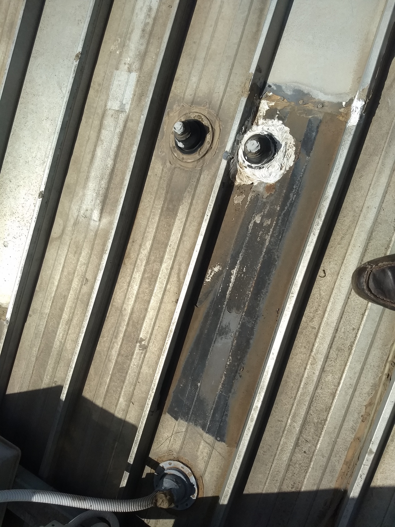 Roof penetrations repaired before Rooflect application
